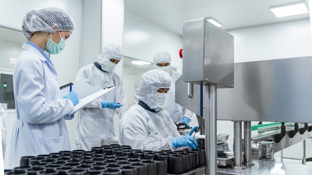 Workers on a clean-room production line
